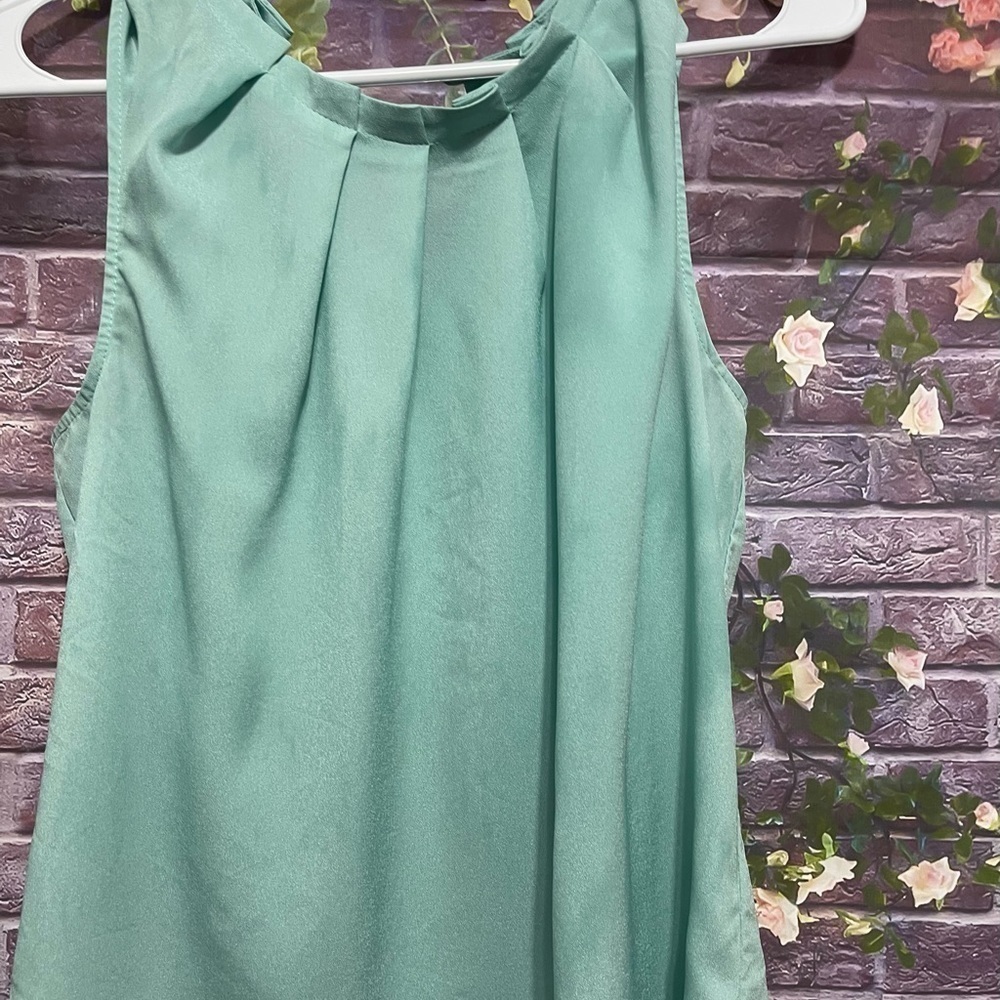 Mint green blouse with pleated neckline